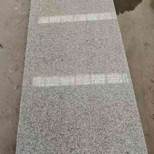 秦皇岛芝麻白光面毛板